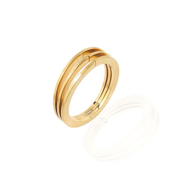 Grande bracciale rigido di ispirazione geomterica in oro giallo 18 kt