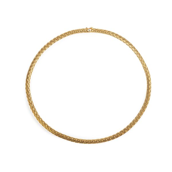 Girocollo a maglia intrecciate  in oro giallo 18 kt