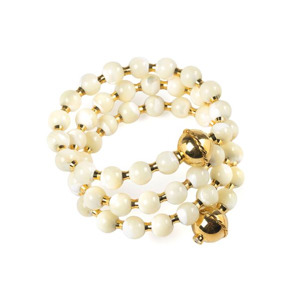 Grande bracciale rigido a quattro giri in pasta vitrea, diamanti e oro giallo 18 kt