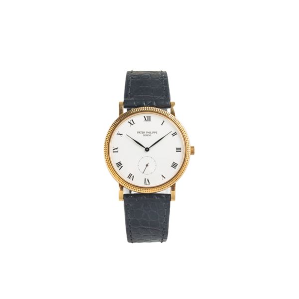 PATEK PHILIPPE Calatrava wristwatch Ref. 3919 in 18 kt yellow gold