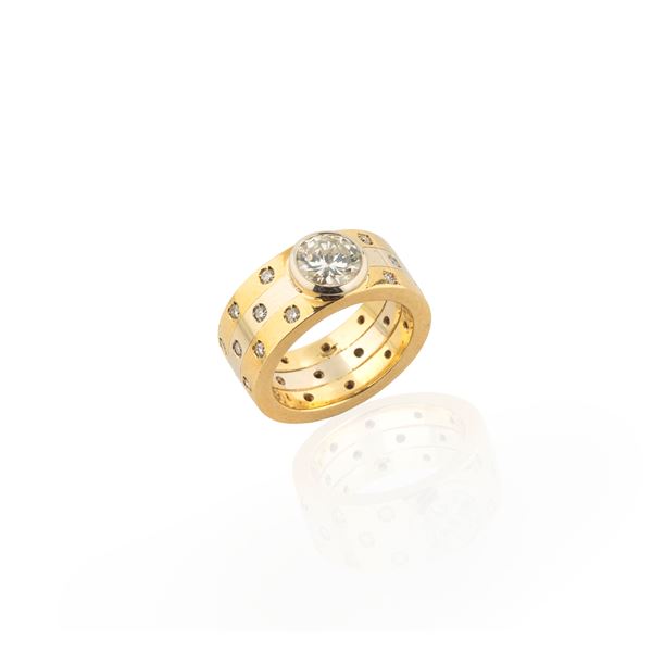 Anello a fascia in oro giallo, bianco 18 kt e diamanti