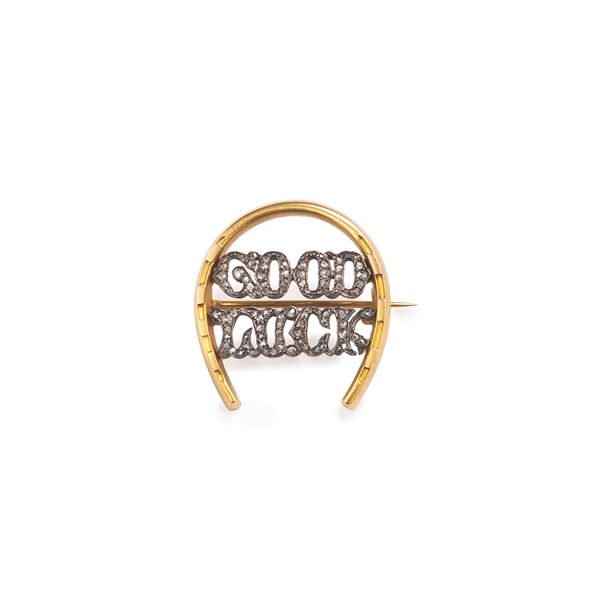 Good Luck brooch in 9 kt yellow gold, silver and diamonds