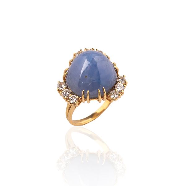 High ring in 18 kt yellow gold, diamonds and Ceylon star sapphire